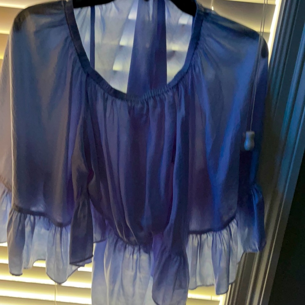 A blue fancy crop top
